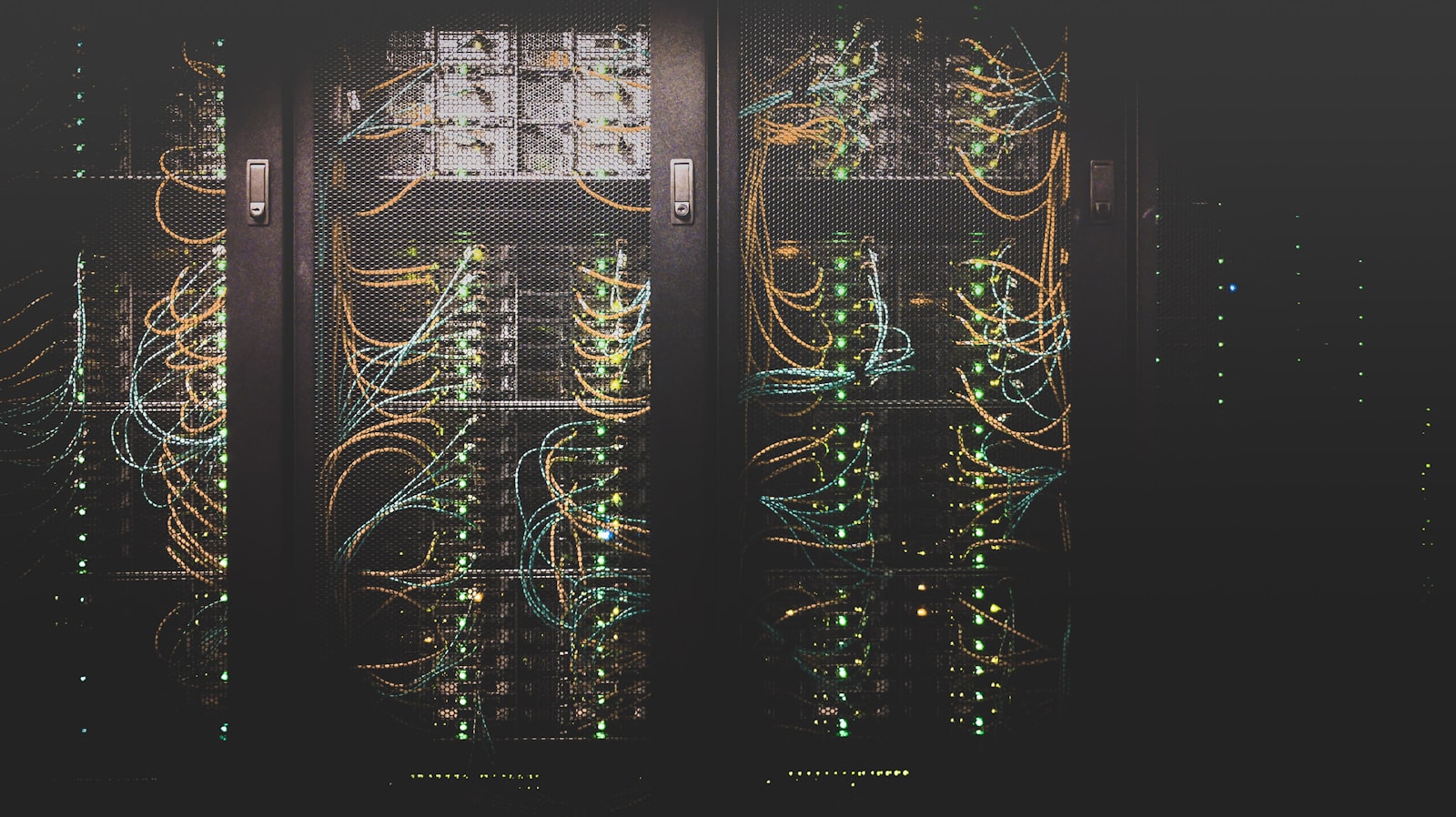 Rows of servers and cabling inside a data center rack