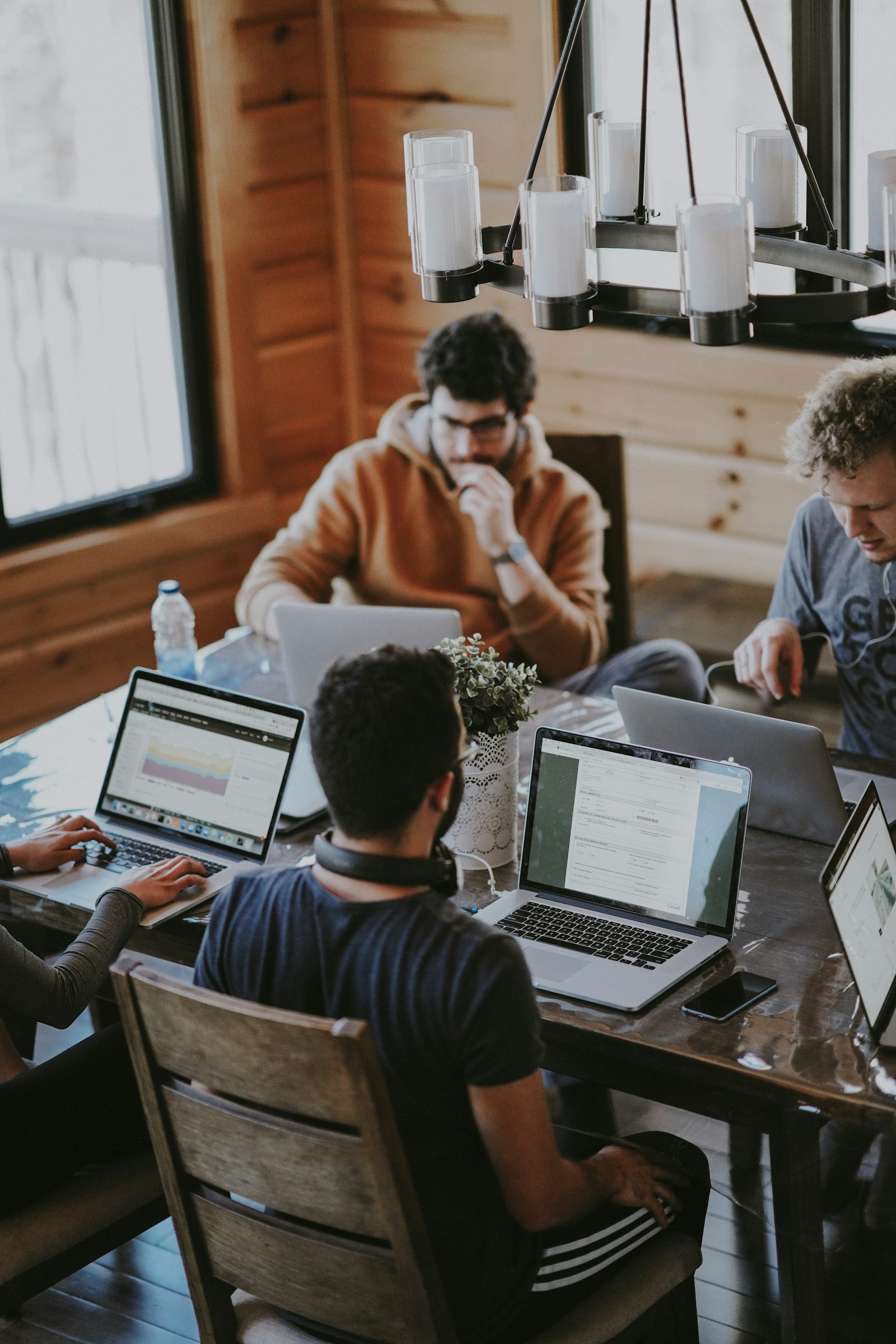 NETCORE professionals collaborating around a table